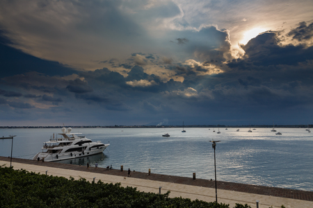 yacht on the water waiting for a storm to roll in