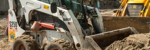 Bobcat machine with bent glass windshield