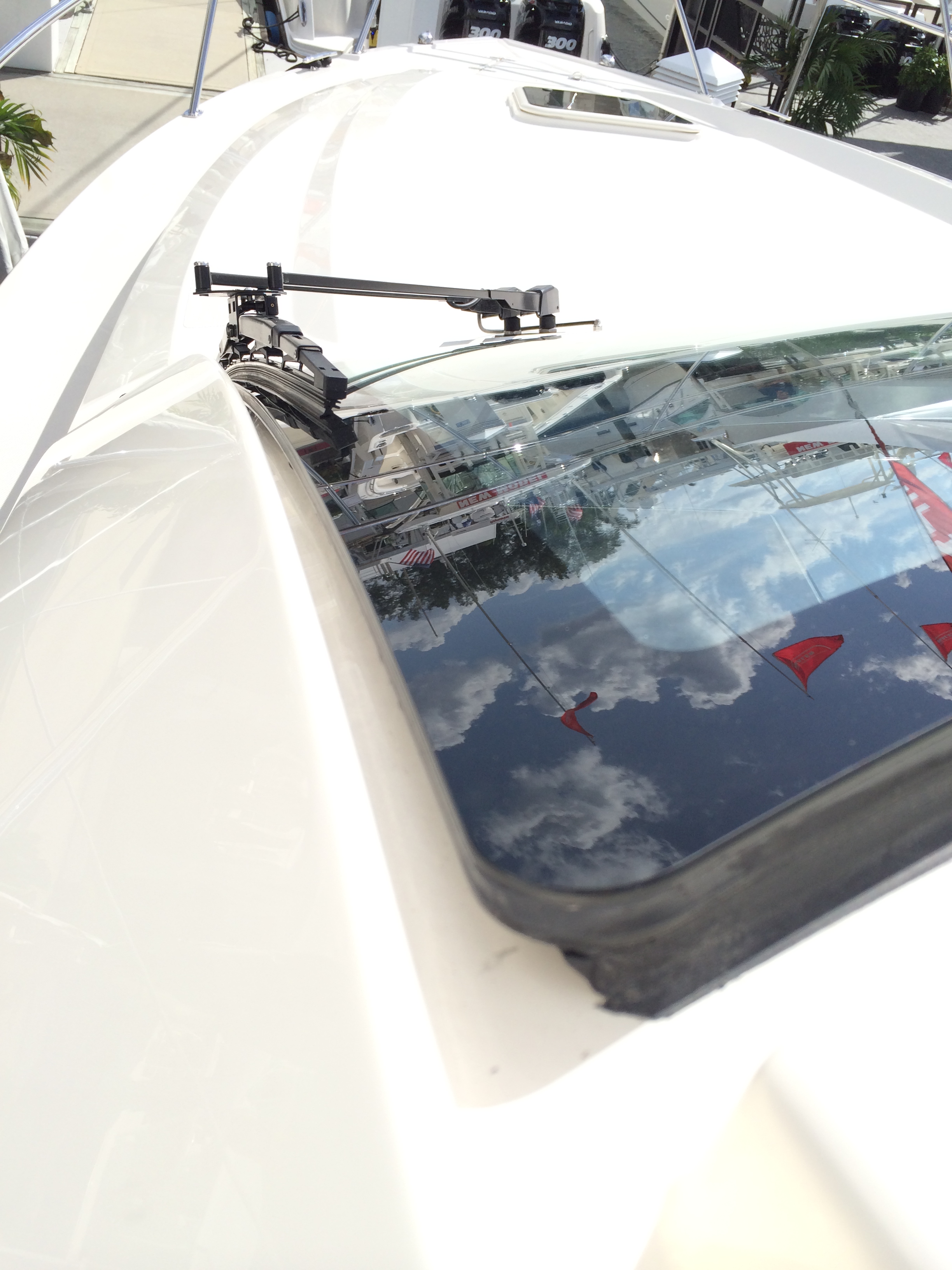 Inspecting the Caulk Around the Boat Glass