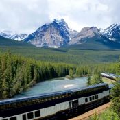 train in canadian rockies with curved glass