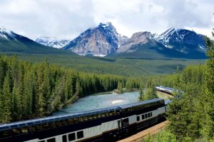 train in canadian rockies with curved glass